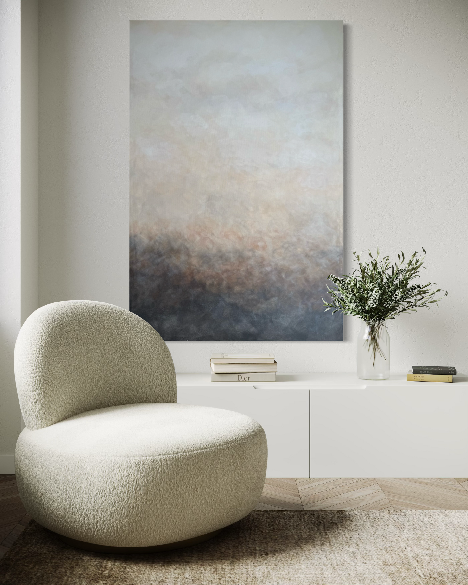 Abstrakt tavla Rökslöja av Elin Palmgren ovanför vit sideboard med bouclé-fåtölj – harmonisk inredning